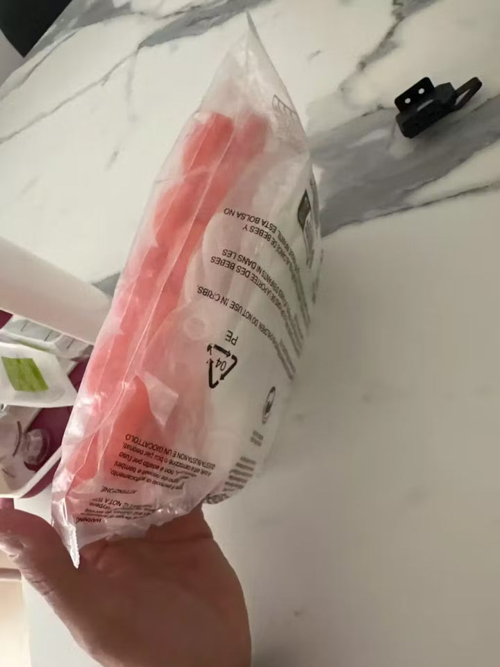 Enfant dormant avec l'oreiller Le P'tit Loup